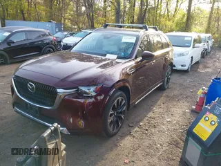 2024 Mazda CX-90 S Premium z VIN JM3KKDHC2R1101502, wystawiony jako IAAI lot #42114075 z przebiegiem 16 288 mil mil oraz . Historia ofert i sprzedaży dostępna na DreamBid. Obrazek 2.