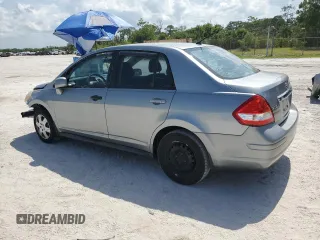2009 Nissan Versa S with VIN 3N1BC11EX9L444814, listed as a Copart auction lot 59732395 with 188,471 mi miles and Salvage title. Bid and sale history available at DreamBid. Image 2.