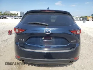 2021 Mazda CX-5 Grand Touring with VIN JM3KFBDM4M1462570, listed as a Copart auction lot 54827675 with 45,389 mi miles and Salvage Title. Bid and sale history available at DreamBid. Image 6.
