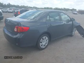 2009 Toyota Corolla with VIN 1NXBU40E39Z067256, listed as a IAAI auction lot 41943961 with 144,659 mi miles. Bid and sale history available at carsss.com. Image 4.