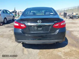 2016 Nissan Altima 2.5 S with VIN 1N4AL3AP6GC285052, listed as a IAAI auction lot 41727727 with 162,560 mi miles. Bid and sale history available at carsss.com. Image 16.