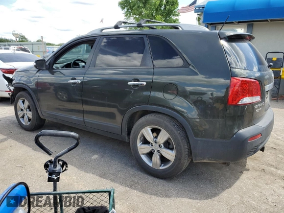 2012 Kia Sorento EX z VIN 5XYKU4A29CG247228, wystawiony jako Copart lot #55521865 z przebiegiem 149 036 mil mil oraz Szkoda całkowita • Salvage title. Historia ofert i sprzedaży dostępna na DreamBid. Obrazek 2.