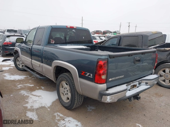 2006 Chevrolet Silverado 1500 LT2 with VIN 1GCEK19B56Z135148, listed as a IAAI auction lot 41616433 with 241,628 mi miles. Bid and sale history available at carsss.com. Image 3.