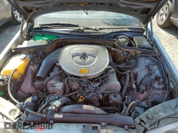 1984 Mercedes-Benz 500 z VIN WDBCA37B9EA072690, wystawiony jako Copart lot #76341244 z przebiegiem Nie podano mil oraz Szkoda całkowita • Salvage title. Historia ofert i sprzedaży dostępna na DreamBid. Obrazek 11.