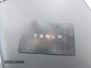2021 Tesla Model 3 Long Range with VIN 5YJ3E1EB6MF053940, listed as a IAAI auction lot 41344978 with 38,544 mi miles and . Bid and sale history available at DreamBid. Image 11.