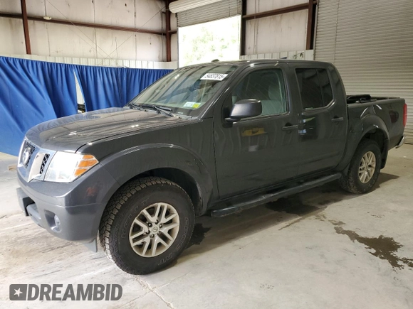 2015 Nissan Frontier Pro-4X with VIN 1N6AD0EV3FN732242, listed as a Copart auction lot 54837815 with 215,576 mi miles and Clean title. Bid and sale history available at DreamBid. Image 1.