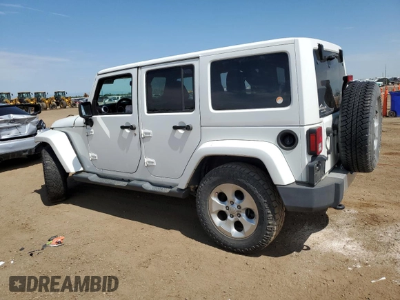 2014 Jeep Wrangler Unlimited Sahara with VIN 1C4BJWEG1EL210949, listed as a Copart auction lot 60977555 with 122,495 mi miles and Salvage title. Bid and sale history available at DreamBid. Image 2.