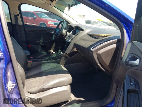 2015 Ford Focus Titanium with VIN 1FADP3J25FL314903, listed as a IAAI auction lot 42053132 with 125,418 mi miles and . Bid and sale history available at carsss.com. Image 5.