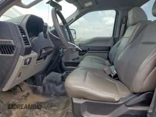 2019 Ford F-150 XL with VIN 1FTMF1CB8KKC24255, listed as a Copart auction lot 64755525 with 100,980 mi miles and Salvage title. Bid and sale history available at DreamBid. Image 7.