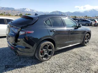 2024 Alfa Romeo Stelvio Ti z VIN ZASPAKBN3R7D79474, wystawiony jako Copart lot #50245995 z przebiegiem 14 558 mil mil oraz Szkoda całkowita • Salvage title. Historia ofert i sprzedaży dostępna na DreamBid. Obrazek 3.