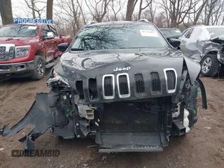 2016 Jeep Cherokee 75th Anniversary with VIN 1C4PJMCB7GW163641, listed as a IAAI auction lot 41743483 with 155,402 mi miles. Bid and sale history available at carsss.com. Image 13.