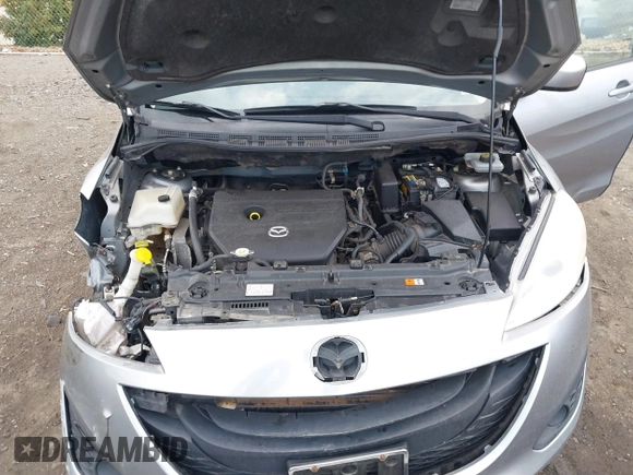 2012 Mazda 5 Sport with VIN JM1CW2BLXC0107933, listed as a IAAI auction lot 41813231 with 164,395 mi miles and . Bid and sale history available at DreamBid. Image 10.