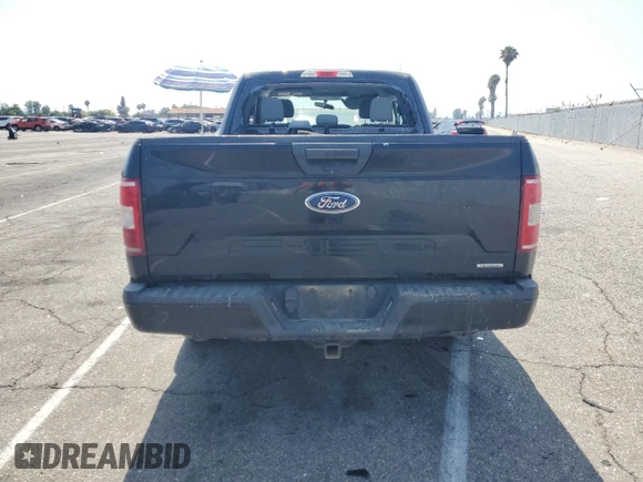 2018 Ford F-150 XL с VIN 1FTEX1CPXJFA44960, выставлен на аукционе Copart как лот 59601855 с пробегом Не указан миль и Списание • Salvage title. История ставок и продаж доступна на DreamBid. Изображение 6.