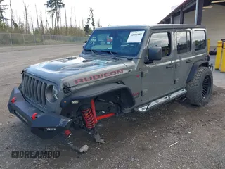 2021 Jeep Wrangler Unlimited Rubicon with VIN 1C4HJXFG9MW531858, listed as a IAAI auction lot 42001095 with 38,240 mi miles and . Bid and sale history available at DreamBid. Image 2.