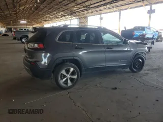 2020 Jeep Cherokee Limited with VIN 1C4PJLDBXLD587216, listed as a Copart auction lot 62034105 with 118,926 mi miles and Salvage title. Bid and sale history available at DreamBid. Image 3.
