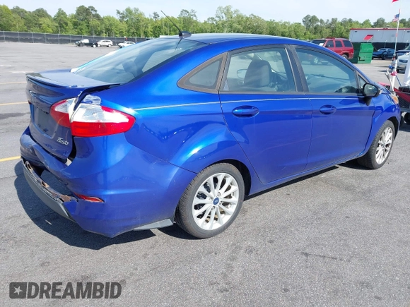 2014 Ford Fiesta SE with VIN 3FADP4BJ5EM190009, listed as a IAAI auction lot 42036976 with 157,575 mi miles. Bid and sale history available at carsss.com. Image 4.