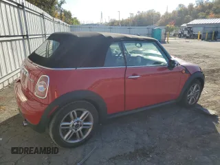 2013 MINI Convertible with VIN WMWZN3C58DT265980, listed as a Copart auction lot 77157154 with 88,975 mi miles and Salvage title. Bid and sale history available at DreamBid. Image 3.