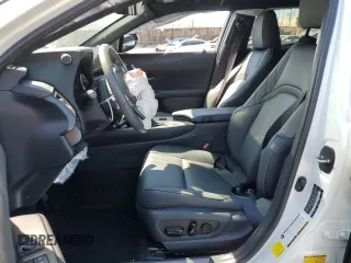 2024 Lexus UX with VIN JTHX6JBH7R2189588, listed as a Copart auction lot 70237664 with 9,963 mi miles and Salvage Title. Bid and sale history available at carsss.com. Image 7.
