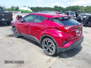 2018 Toyota C-HR XLE with VIN NMTKHMBX5JR013469, listed as a IAAI auction lot 42356609 with 32,051 mi miles and . Bid and sale history available at DreamBid. Image 3.