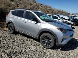 2018 Toyota RAV4 XLE with VIN 2T3RFREV0JW802429, listed as a Copart auction lot 49906515 with 53,544 mi miles and Salvage Title. Bid and sale history available at DreamBid. Image 4.