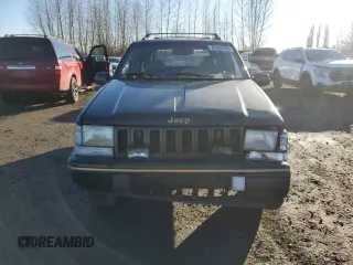 1995 Jeep Grand Cherokee Limited with VIN 1J4GZ78S7SC613568, listed as a Copart auction lot 83365584 with 184,099 mi miles and Salvage Title. Bid and sale history available at carsss.com. Image 5.