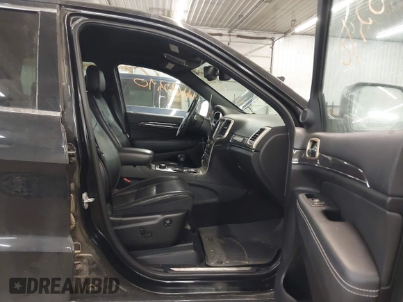 2014 Jeep Grand Cherokee Overland with VIN 1C4RJFCG8EC177899, listed as a IAAI auction lot 41695290 with 200,867 mi miles and . Bid and sale history available at DreamBid. Image 5.