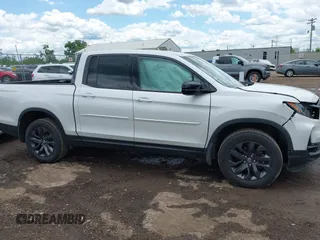 2021 Honda Ridgeline Sport with VIN 5FPYK3F14MB005117, listed as a IAAI auction lot 42343059 with 58,862 mi miles and . Bid and sale history available at DreamBid. Image 13.
