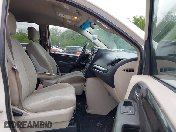 2013 Dodge Grand Caravan SE with VIN 2C4RDGBG8DR505844, listed as a IAAI auction lot 42139152 with 206,399 mi miles and . Bid and sale history available at DreamBid. Image 5.