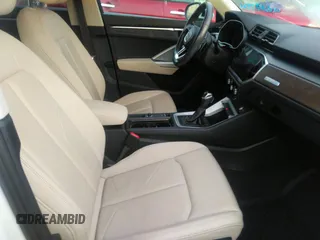 2022 Audi Q3 S line Premium Plus with VIN WA1EECF35N1035137, listed as a IAAI auction lot 42279961 with 43,458 mi miles and . Bid and sale history available at DreamBid. Image 5.