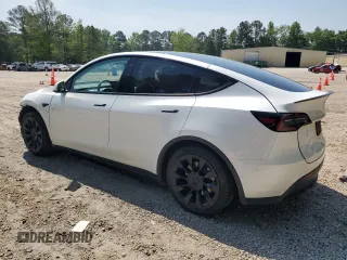 2022 Tesla Model Y Long Range z VIN 7SAYGDEE1NF354633, wystawiony jako Copart lot #55221835 z przebiegiem 53 821 mil mil oraz Szkoda całkowita • Salvage title. Historia ofert i sprzedaży dostępna na DreamBid. Obrazek 2.