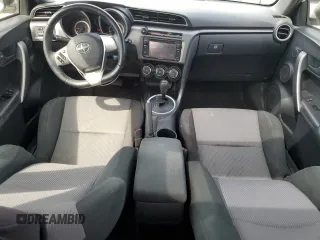 2014 Scion tC z VIN JTKJF5C70E3084697, wystawiony jako Copart lot #54307295 z przebiegiem 174 073 mil mil oraz Szkoda całkowita • Salvage title. Historia ofert i sprzedaży dostępna na DreamBid. Obrazek 8.