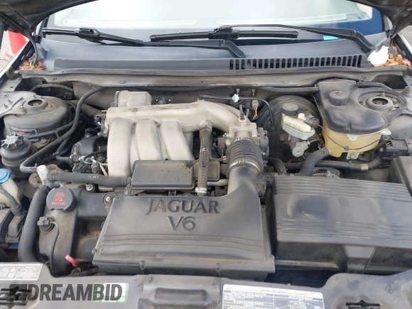 2004 Jaguar X-Type with VIN SAJEA51C44WD56659, listed as a IAAI auction lot 41712395 with Not Provided miles and . Bid and sale history available at DreamBid. Image 10.