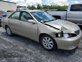 2004 Toyota Camry LE z VIN 4T1BF32K94U571035, wystawiony jako Copart lot #56749935 z przebiegiem 136 361 mil mil oraz Szkoda całkowita • Salvage title. Historia ofert i sprzedaży dostępna na DreamBid. Obrazek 4.