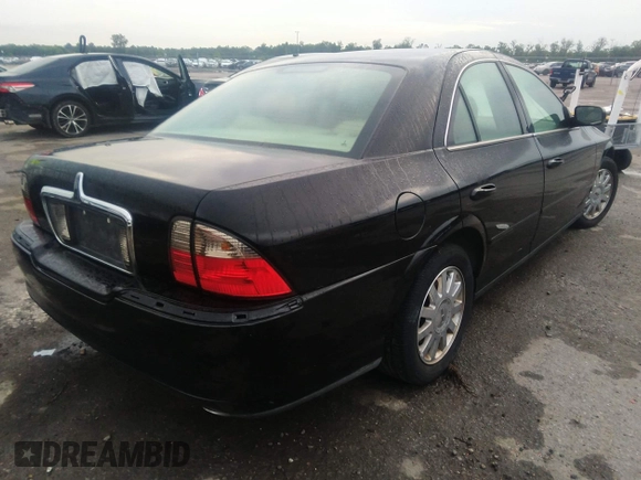 2005 Lincoln LS w/Luxury Pkg with VIN 1LNHM86S85Y606813, listed as a IAAI auction lot 39938974 with 131,558 mi miles. Bid and sale history available at carsss.com. Image 4.