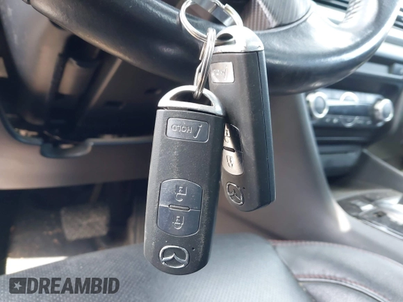 2014 Mazda 3 S Grand Touring with VIN JM1BM1M39E1149581, listed as a IAAI auction lot 41813917 with 143,019 mi miles and . Bid and sale history available at DreamBid. Image 11.