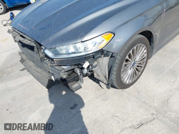 2014 Ford Fusion Titanium with VIN 3FA6P0K90ER358536, listed as a IAAI auction lot 41931474 with 170,856 mi miles. Bid and sale history available at carsss.com. Image 6.
