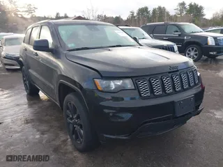 2021 Jeep Grand Cherokee Laredo X with VIN 1C4RJFAG6MC599672, listed as a IAAI auction lot 41323741 with 71,491 mi miles. Bid and sale history available at carsss.com. Image 1.
