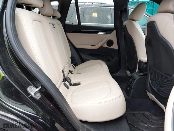 2018 BMW X1 xDrive28i with VIN WBXHT3C39J3H30531, listed as a IAAI auction lot 41890734 with 59,147 mi miles. Bid and sale history available at carsss.com. Image 8.