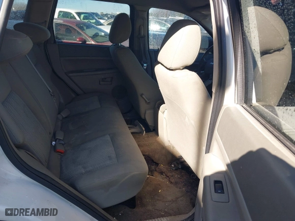 2007 Jeep Grand Cherokee Laredo with VIN 1J8HS48PX7C657685, listed as a IAAI auction lot 41748528 with 247,534 mi miles. Bid and sale history available at carsss.com. Image 8.