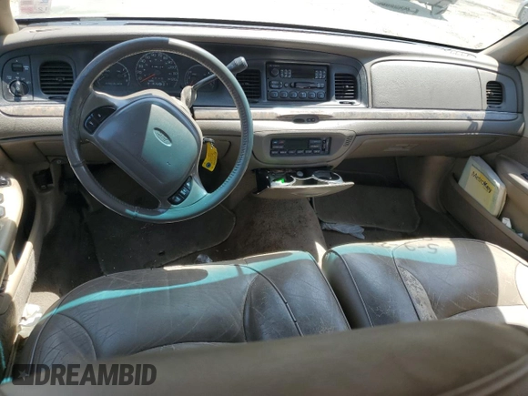 1999 Ford Crown Victoria LX z VIN 2FAFP74W1XX122364, wystawiony jako Copart lot #56929455 z przebiegiem 118 134 mil mil oraz Szkody całkowita. Historia ofert i sprzedaży dostępna na DreamBid. Obrazek 8.