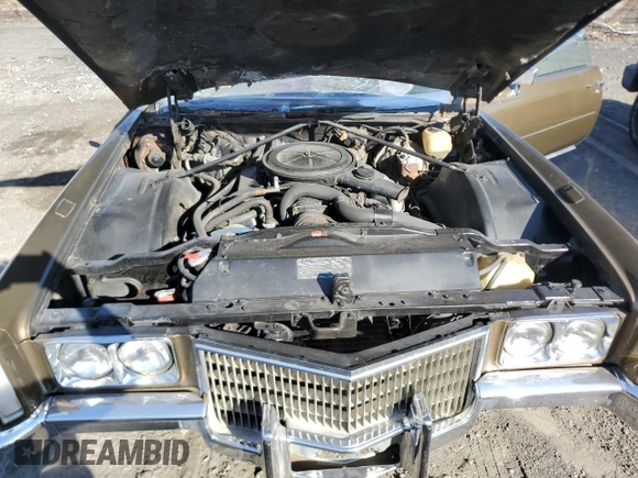 1971 Cadillac Eldorado z VIN 693671Q424620, wystawiony jako Copart lot #48917885 z przebiegiem Nie podano mil oraz Szkoda całkowita • Salvage title. Historia ofert i sprzedaży dostępna na DreamBid. Obrazek 11.