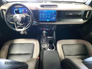 2023 Ford Bronco z VIN 1FMEE5DP1PLB74756, wystawiony jako Copart lot #46458355 z przebiegiem 23 744 mil mil oraz Szkoda całkowita • Salvage title. Historia ofert i sprzedaży dostępna na DreamBid. Obrazek 8.