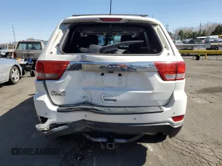 2011 Jeep Grand Cherokee Laredo with VIN 1J4RR4GG3BC671780, listed as a Copart auction lot 49179835 with 166,521 mi miles and Salvage Title. Bid and sale history available at carsss.com. Image 6.