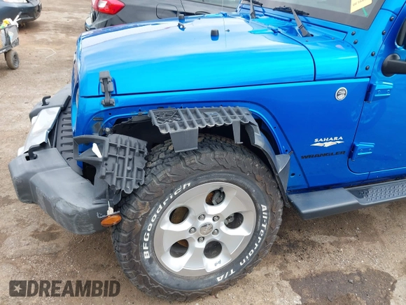 2015 Jeep Wrangler Sahara with VIN 1C4AJWBG9FL663959, listed as a IAAI auction lot 42133900 with 56,253 mi miles and . Bid and sale history available at DreamBid. Image 6.