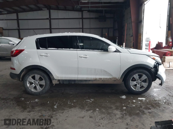 2013 Kia Sportage LX z VIN KNDPBCA28D7356137, wystawiony jako IAAI lot #41577243 z przebiegiem 141 985 mil mil oraz . Historia ofert i sprzedaży dostępna na DreamBid. Obrazek 12.