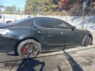 2014 Maserati Ghibli S Q4 z VIN ZAM57RTA9E1106695, wystawiony jako IAAI lot #40783416 z przebiegiem 92 885 mil mil oraz . Historia ofert i sprzedaży dostępna na DreamBid. Obrazek 13.