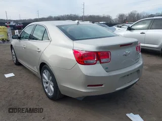 2014 Chevrolet Malibu LT with VIN 1G11E5SLXEF255357, listed as a IAAI auction lot 41363252 with 259,751 mi miles and . Bid and sale history available at DreamBid. Image 3.