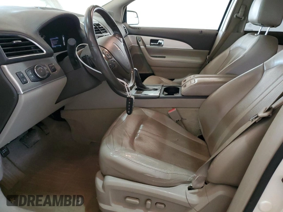 2013 Lincoln MKX z VIN 2LMDJ6JKXDBL19895, wystawiony jako Copart lot #51623655 z przebiegiem 245 542 mil mil oraz Szkoda całkowita • Salvage title. Historia ofert i sprzedaży dostępna na DreamBid. Obrazek 7.