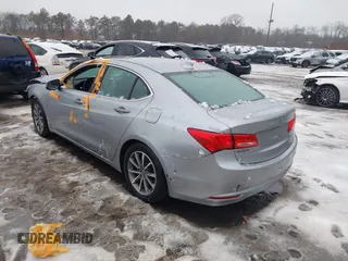 2019 Acura TLX with VIN 19UUB1F38KA009420, listed as a IAAI auction lot 41459987 with 102,336 mi miles. Bid and sale history available at carsss.com. Image 3.