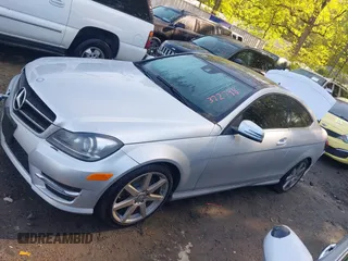 2015 Mercedes-Benz C with VIN WDDGJ4HB1FG372798, listed as a IAAI auction lot 41968536 with 56,007 mi miles. Bid and sale history available at carsss.com. Image 14.